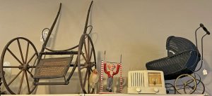 Photo of an item for sale at Fly Trap Antiques: 1863 Dog-Goat Sulky with wooden wheels plus doll carriage, clown toy and antique radio