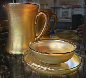 Photo of an item for sale at Fly Trap Antiques: this is a rare old authentic SIGNED golden glass pitcher and bowl, by TIFFANY.